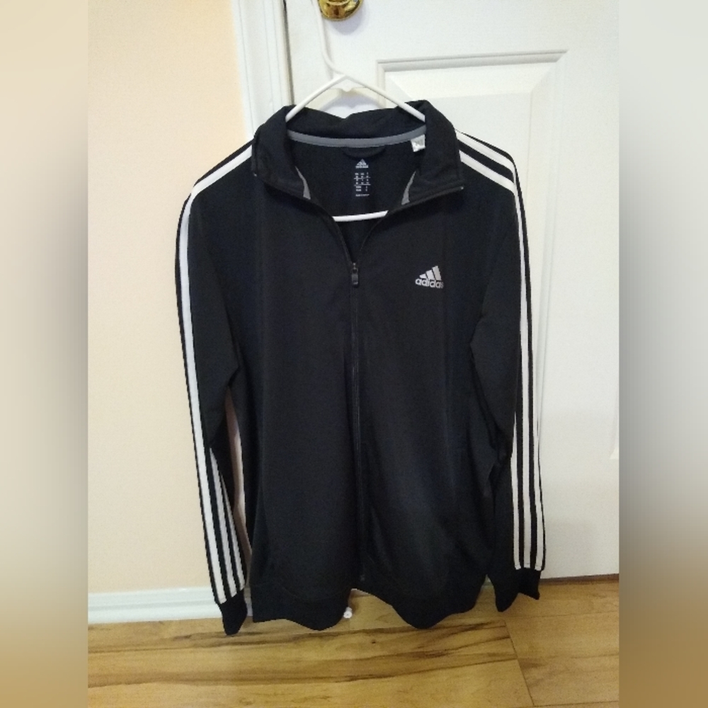 Adidas essential track jacket brand new unworn, but there is no tag. Size M